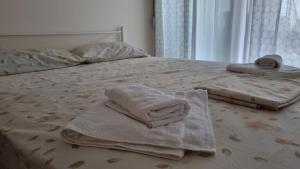 Postel nebo postele na pokoji v ubytování Ionian Dream Home