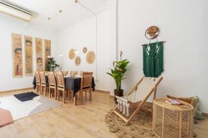 a dining room with a table and chairs at Nabeel Homes - Seaview Rooftop - San Stefano in Alexandria +81 photos