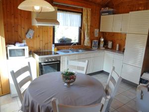 a kitchen with a table with a bowl on it at Attractive holiday home in Hampteau with garden in Hampteau