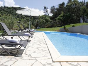 The swimming pool at or close to Spacious Villa on Sea in Corfu