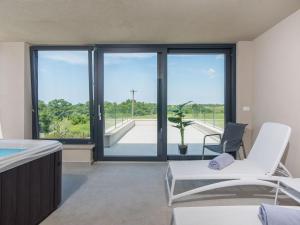 a room with a view of a living room at Apartment in Croatia near the Coast in Brtonigla
