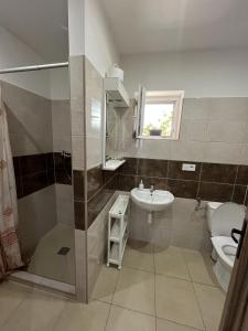 Koupelna v ubytování SUNNY Apartman