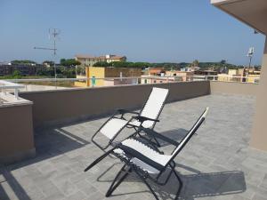 En balkon eller terrasse på Terrazza delle rose