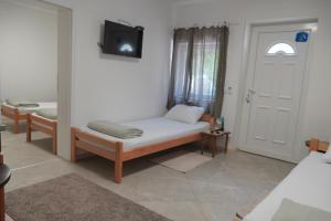 Letto o letti in una camera di SOBE AVA