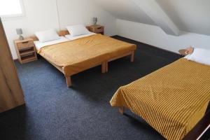 Letto o letti in una camera di SOBE AVA