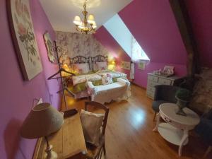 Postel nebo postele na pokoji v ubytování Moulin de la Beraudaie