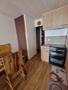Kuchyň nebo kuchyňský kout v ubytování Appartement en résidence