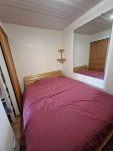 Postel nebo postele na pokoji v ubytování Appartement en résidence