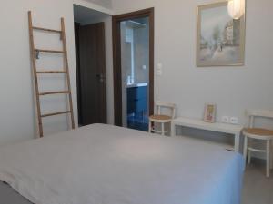 Postel nebo postele na pokoji v ubytování Eva's place