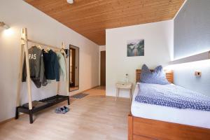 Postel nebo postele na pokoji v ubytování Landhotel Fuchs