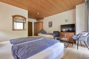 Postel nebo postele na pokoji v ubytování Landhotel Fuchs