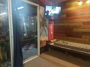 TV a/nebo společenská místnost v ubytování Ti Coin Des hauts de saint joseph 974