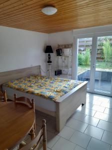 Ένα ή περισσότερα κρεβάτια σε δωμάτιο στο Le Vintage