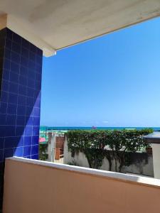 a view of the ocean from the balcony of a building at Lacasadelmare in Francavilla al Mare