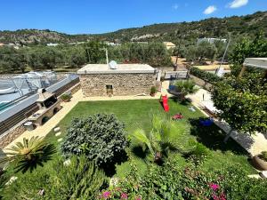 an aerial view of a garden with a building at BIO Garden New House in Gonia
