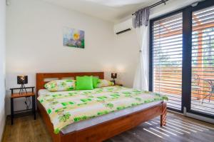 Postel nebo postele na pokoji v ubytování Apartmány Hrušky - wellness