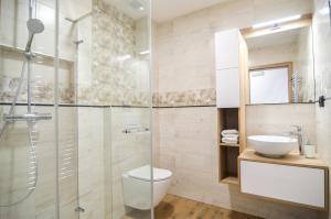 Koupelna v ubytování Apartmány Hrušky - wellness + 19 fotografií