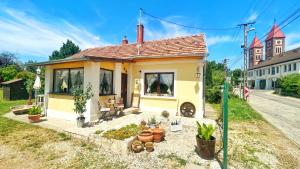 a small house on the side of a street at Lady Lavender House in Balatonfüred