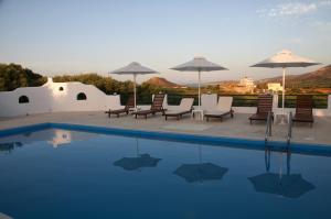 The swimming pool at or close to Cavo Plako Villas