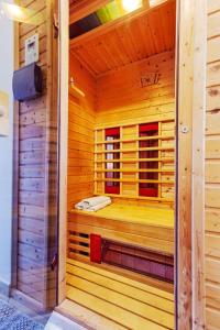 a wooden sauna with a bed inside of it at Lady Lavender House in Balatonfüred