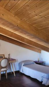 Giường trong phòng chung tại B&B Il borgo incantato