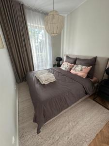 Кровать или кровати в номере Pärnu rannarajooni apartment
