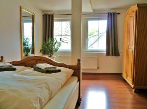 Ένα ή περισσότερα κρεβάτια σε δωμάτιο στο Haus-Wolter