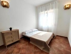 Кровать или кровати в номере Villa singola Amanda - 500m dal mare +12 фотографий
