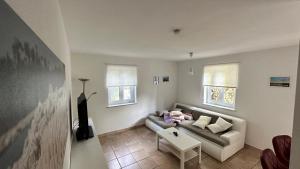 Χώρος καθιστικού στο Ferienwohnung in Oberschondorf mit Terasse +3 φωτογραφίες