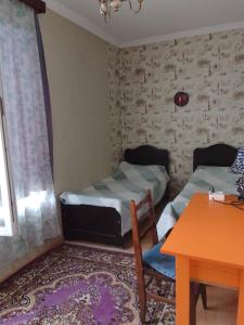 Postel nebo postele na pokoji v ubytování Guest house Luck + 3 fotografie