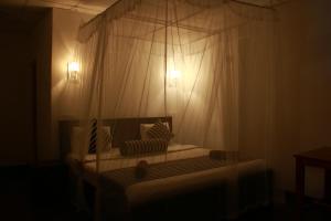 Een bed of bedden in een kamer bij Different View