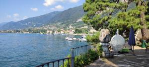 a view of a body of water with boats in it at Casa Milla in Tremezzo