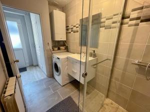 Koupelna v ubytování Maison + 9 fotografií