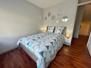 Postel nebo postele na pokoji v ubytování Maison