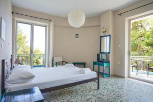 Postel nebo postele na pokoji v ubytování Hotel Korfos - Ξενοδοχείο Κόρφος Renovated