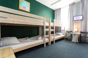 Postel nebo postele na pokoji v ubytování Moon Hostel Gdańsk