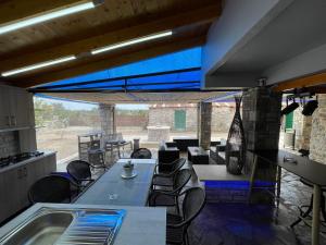 Foto dalla galleria di ΒΙΛΛΑ ΤΟ ΠΕΤΡΙΝΟ stone bild villa full equipment a Nafpaktos