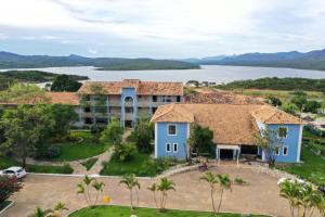 an aerial view of a house with a lake at Granville Eco Resort in Rio de Contas