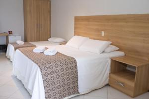 Uma cama ou camas num quarto em Granville Eco Resort