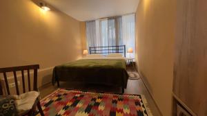 Voodi või voodid majutusasutuse Hostel Nomad toas