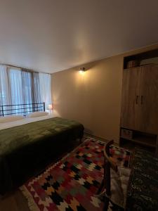 Voodi või voodid majutusasutuse Hostel Nomad toas