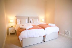 Katil atau katil-katil dalam bilik di Bridgnorth Town House