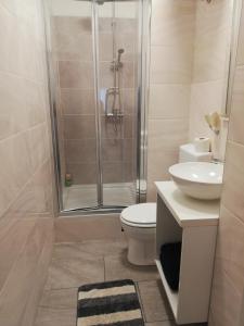 Kúpeľňa v ubytovaní Apartments Simple Teslina + 37 fotografií