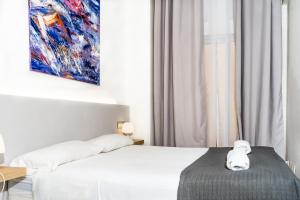 Postel nebo postele na pokoji v ubytování Apartamentos Turísticos Centro Histórico, by CartagenaSpain