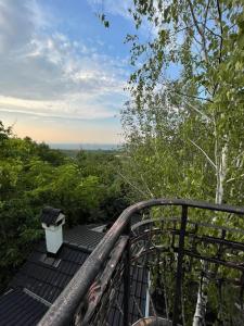 a view from the top of a wooden deck at Vila Belashtitsa in Belashtitsa