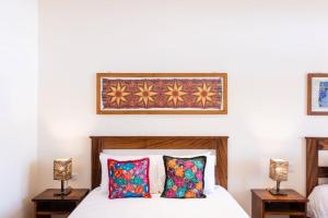 Ένα ή περισσότερα κρεβάτια σε δωμάτιο στο Valle Escondido Nature Reserve Hotel & Farm