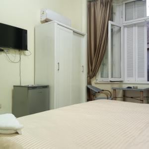 TV a/nebo společenská místnost v ubytování New Panorama Palace