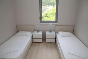 Postel nebo postele na pokoji v ubytování Hotel Ponta Nova