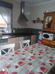 Kuchyň nebo kuchyňský kout v ubytování La Buganvilla + 9 fotografií