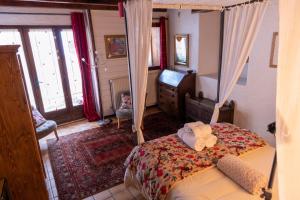 Postel nebo postele na pokoji v ubytování La Portette Chambres d'Hôtes